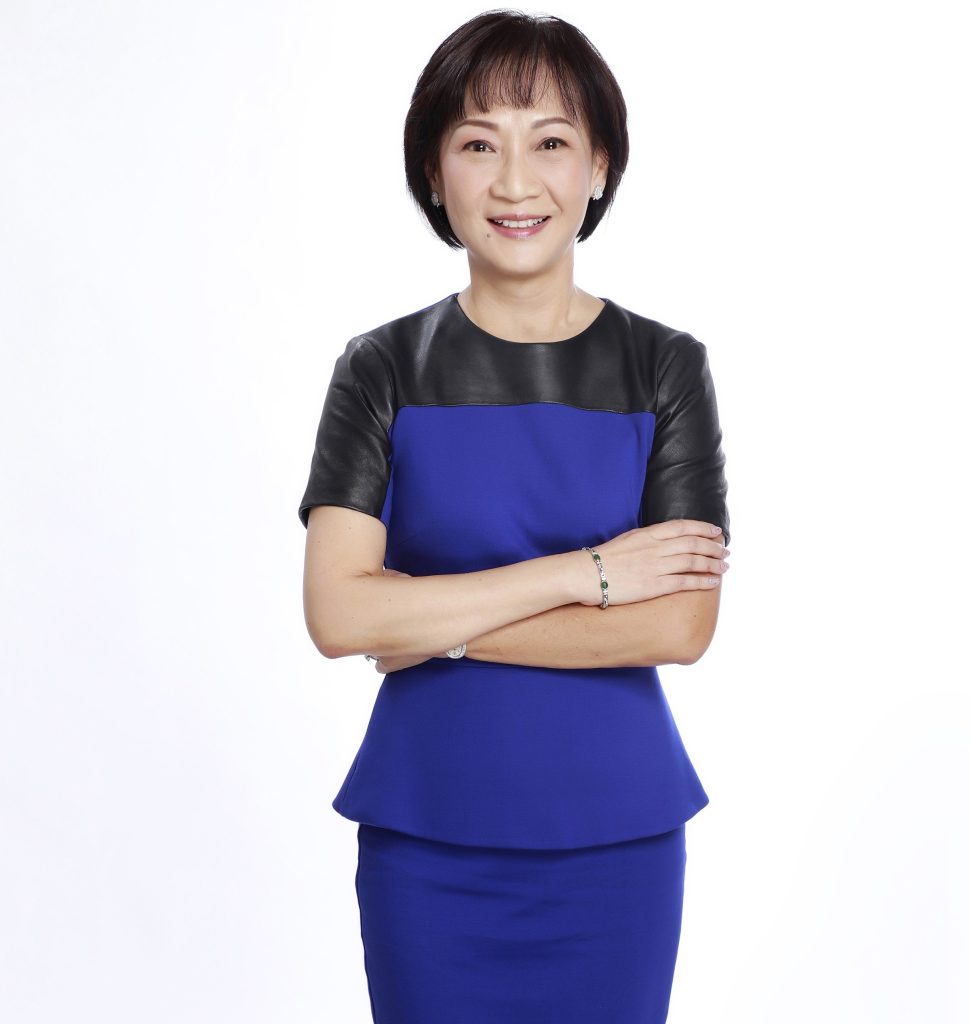 an older woman posing with smile