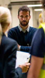 man looks serious at co worker